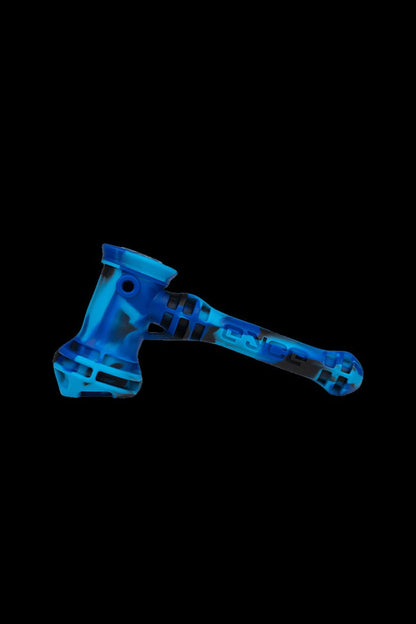 Blue glass cannabis water pipe on a black background.