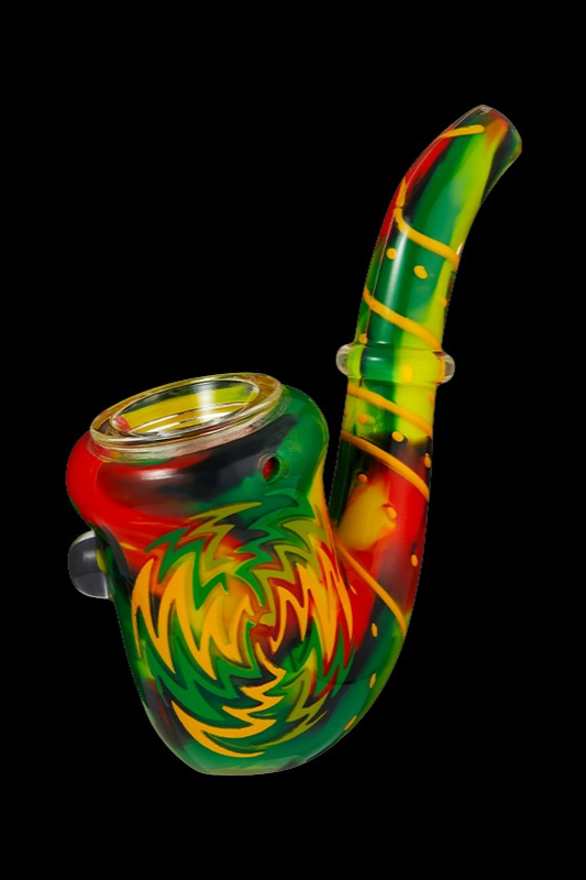 Colorful glass pipe with swirling green, red, and yellow patterns.