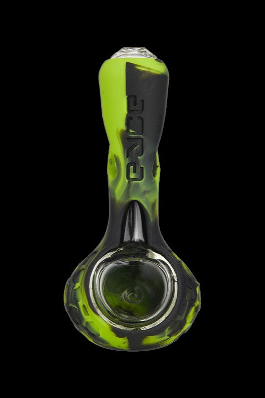 Green glass pipe with “core” text etched along the stem.