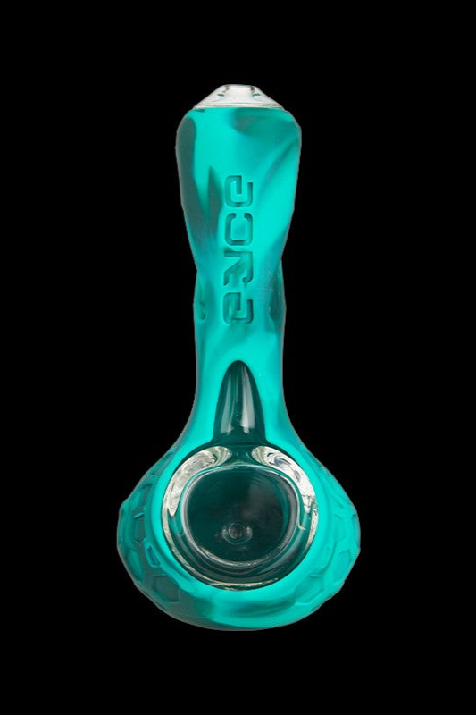 Turquoise glass pipe with etched branding, studio shot.
