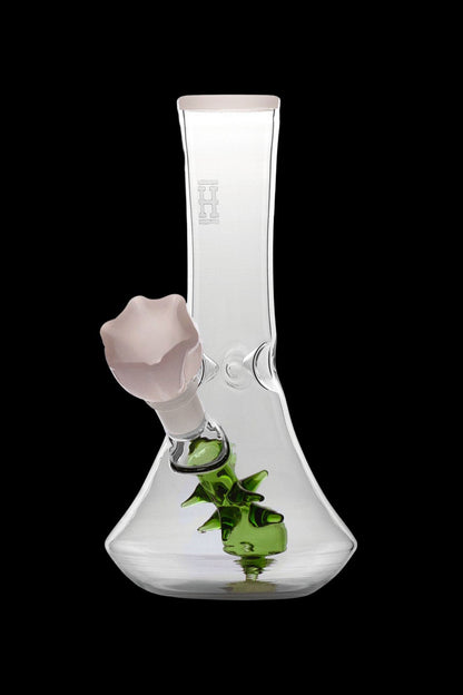 Glass bong with cannabis leaf inside.
