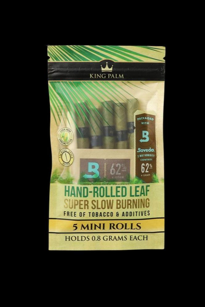 Package of King Palm hand-rolled leaf smoking rolls with Boveda humidity control pack. 5 rolls, 0.8 grams each, tobacco & additive free.