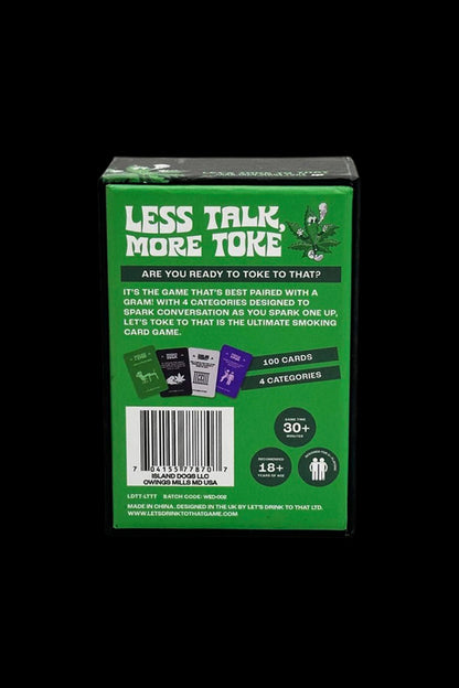 Close-up of a green and white box for the card game "Less Talk, More Toke," marketed as a conversation starter for cannabis users, with details about 100 cards, 4 categories, and a 30+ minute playtime, with an 18+ age recommendation.