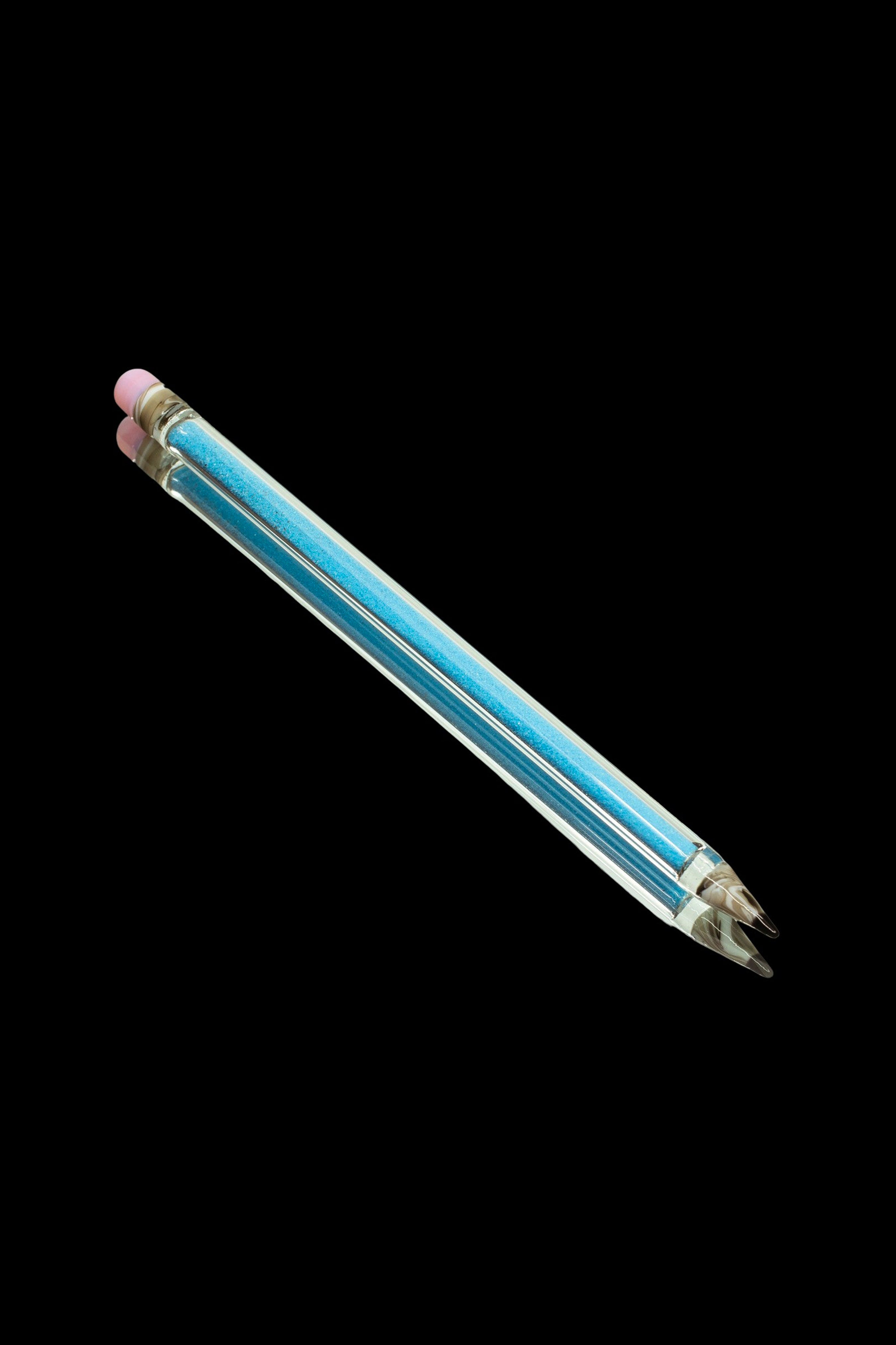 Iridescent glass cannabis oil burner pipe on a black background.