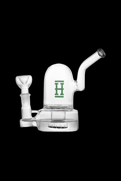 Clear glass water pipe with a green "H" logo.