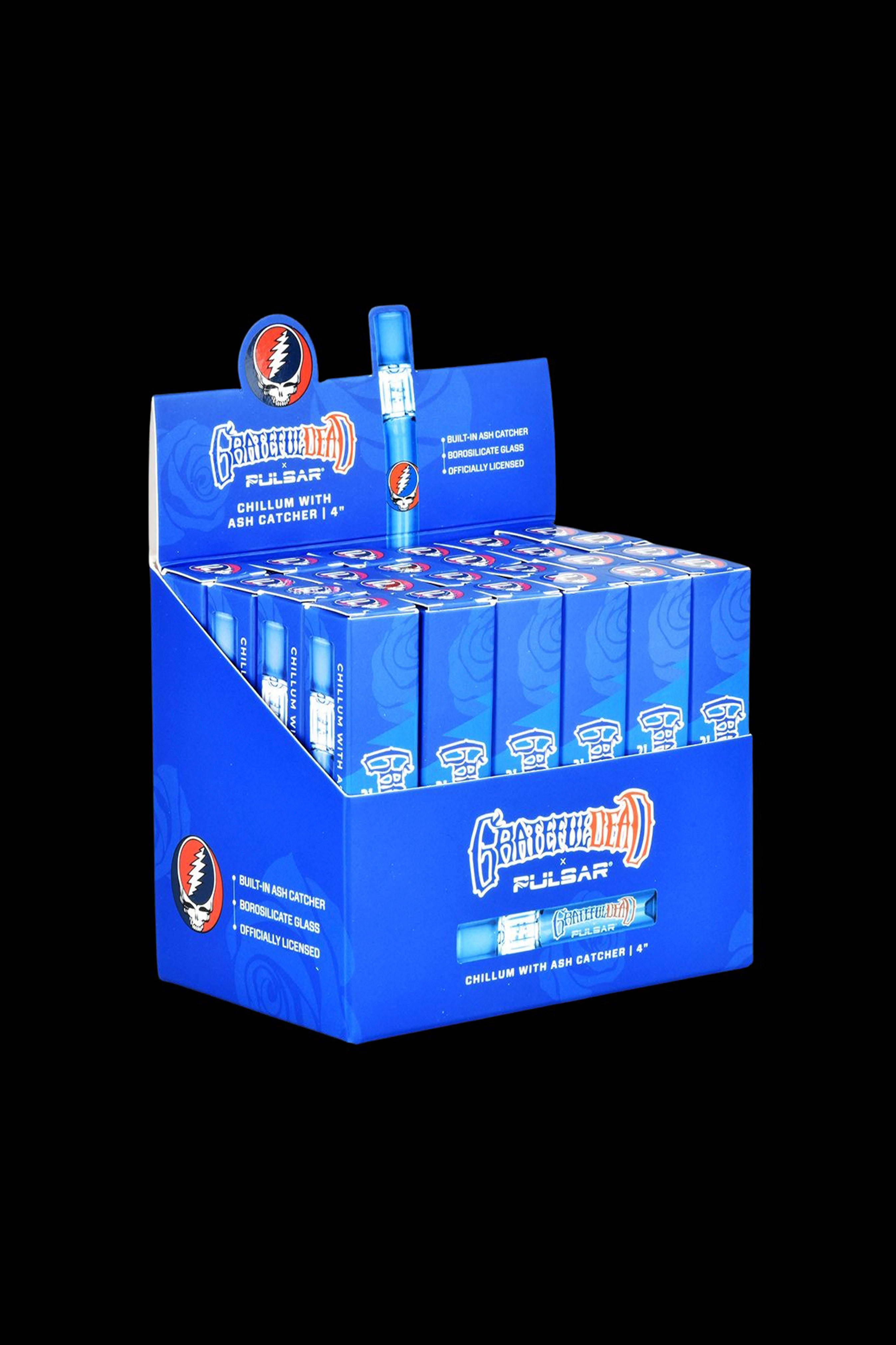 A display box of Pulsar x Grateful Dead Chillums with built-in ash catchers, featuring repeating psychedelic skull and rose graphics.