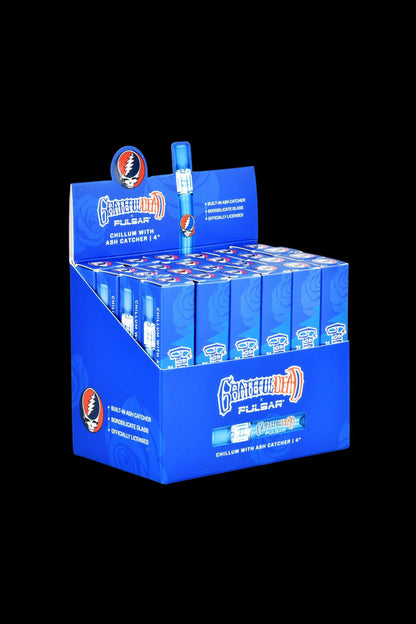 A display box of Pulsar x Grateful Dead Chillums with built-in ash catchers, featuring repeating psychedelic skull and rose graphics.