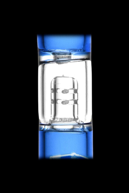 Blue glass dab rig with quartz banger.