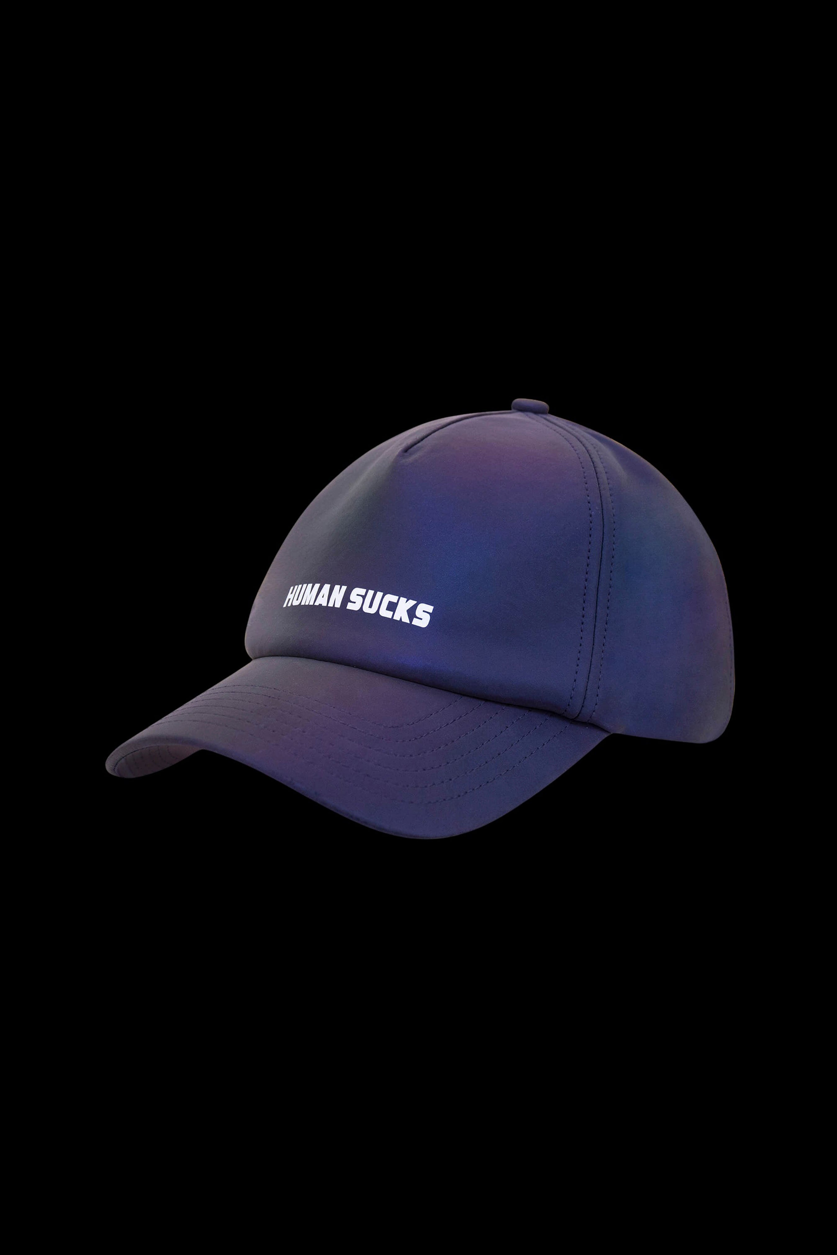 Iridescent baseball cap with “HUMAN SUCKS” embroidered on the front, isolated on a black background.
