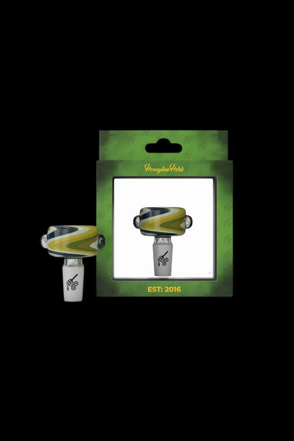 Packaged cannabis oil vape cartridge with a yellow and green design, branded “Honeybee Herb” and established in 2016.