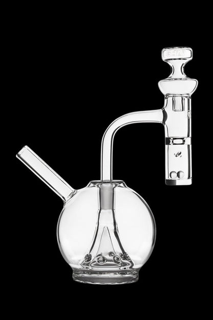 Clear glass bubbler and dab rig set against a black background.