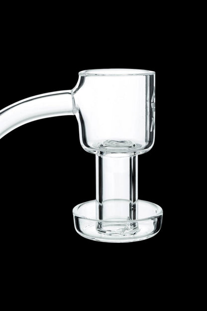 Clear quartz dab rig insert against a black background.