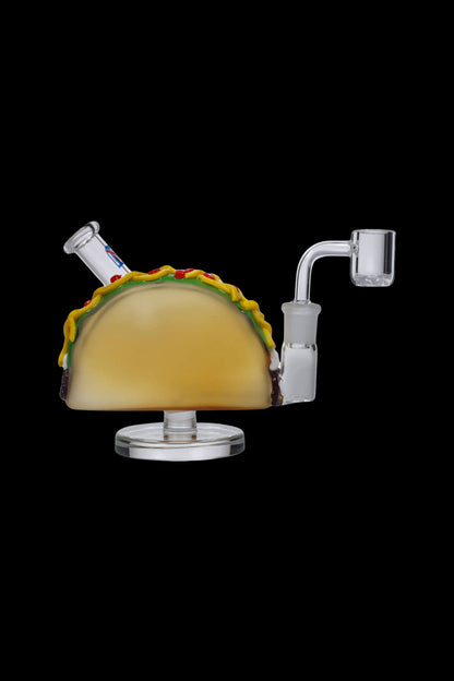 Glass dab rig shaped like a taco with a quartz banger.