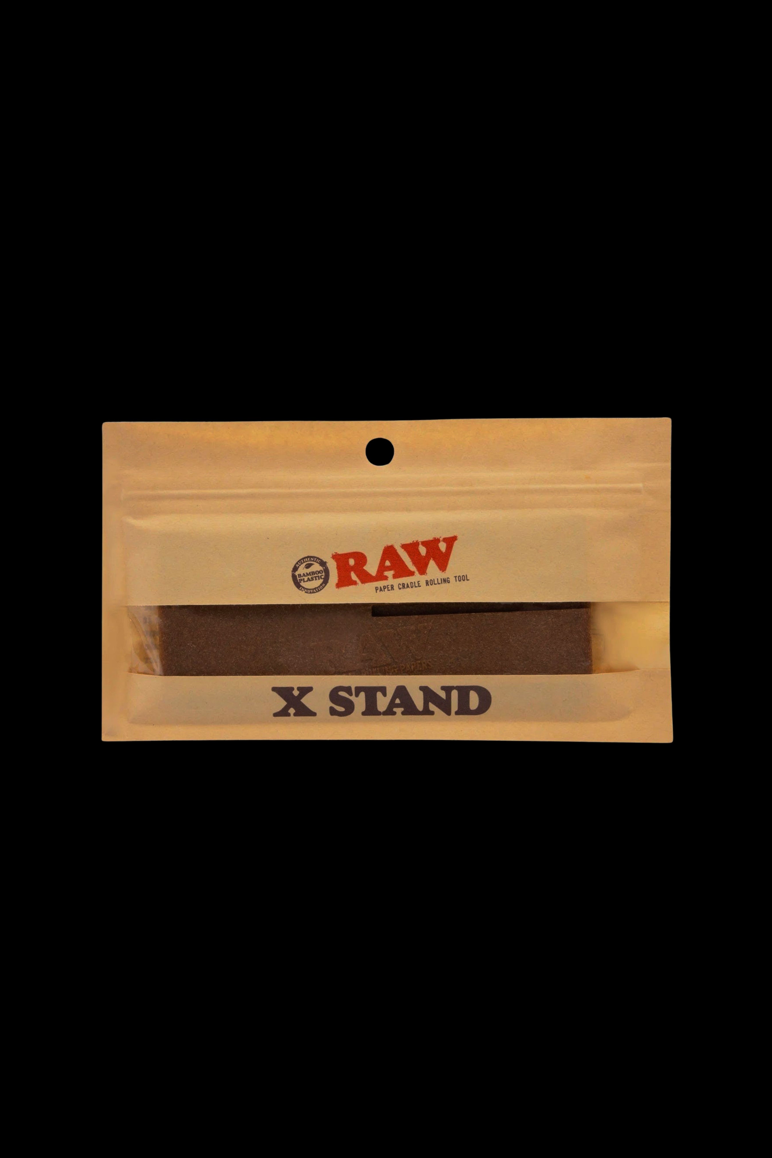 Wooden rolling box for cannabis with “RAW” and “X STAND” branding.