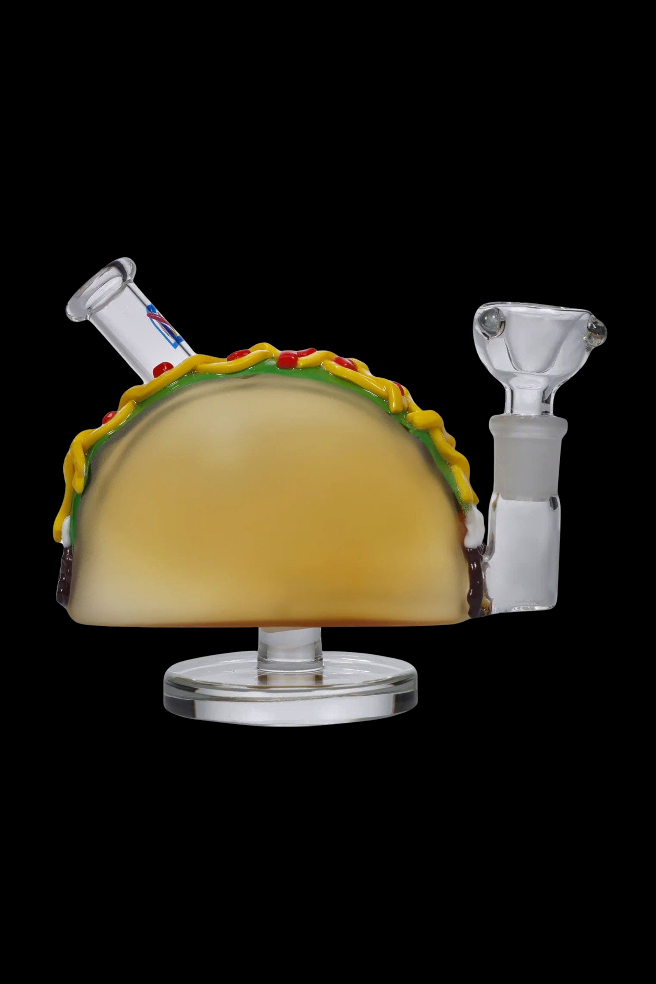 Glass water pipe shaped like a taco, with a clear mouthpiece and base.