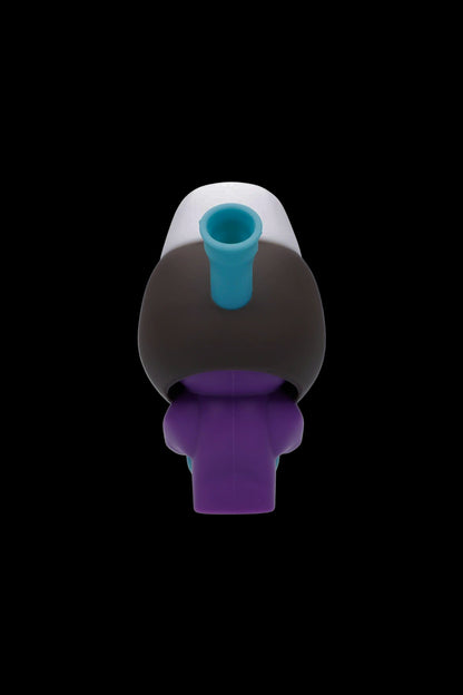 Silicone dab rig water pipe in shades of purple, black, and teal against a black background.