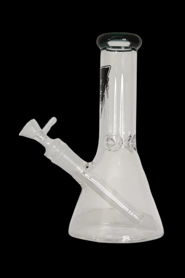 Glass bong with black accents against a black background.