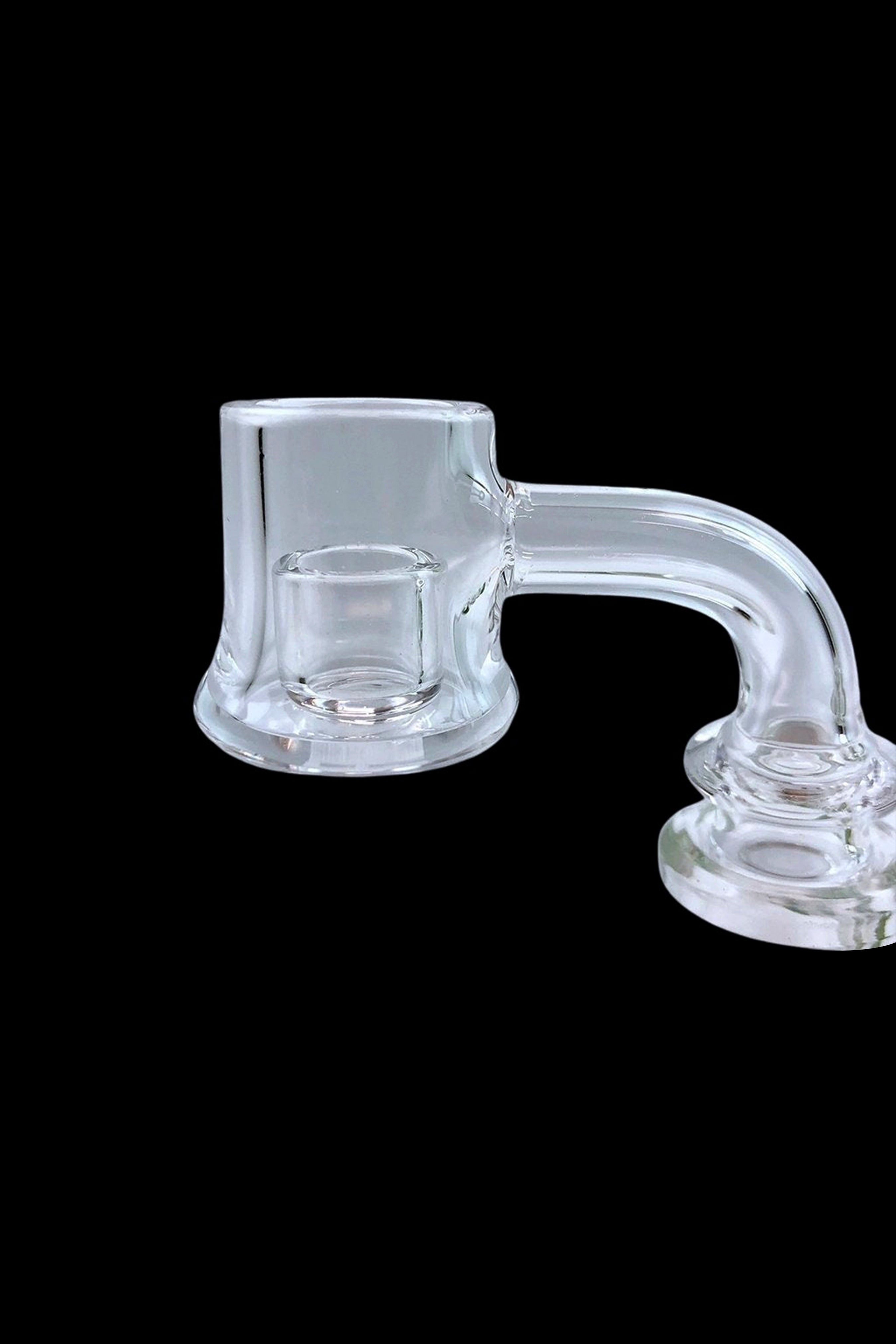 Clear glass dab rig accessory on a black background.