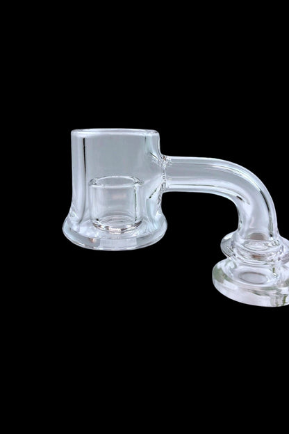 Clear glass dab rig accessory on a black background.