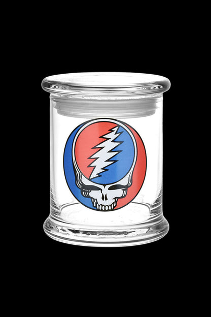 Glass jar with the iconic Grateful Dead “Steal Your Face” skull logo.