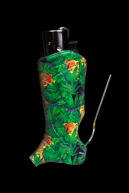 Cannabis-themed glass pipe with a vibrant green and purple leaf pattern, isolated on a black background."