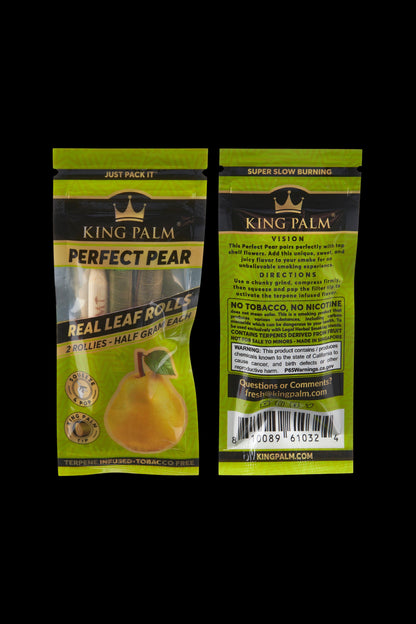 Close-up of two King Palm Perfect Pear pre-rolled hemp cones in yellow packaging, labeled “Terpene Infused – Tobacco Free” with health warnings.