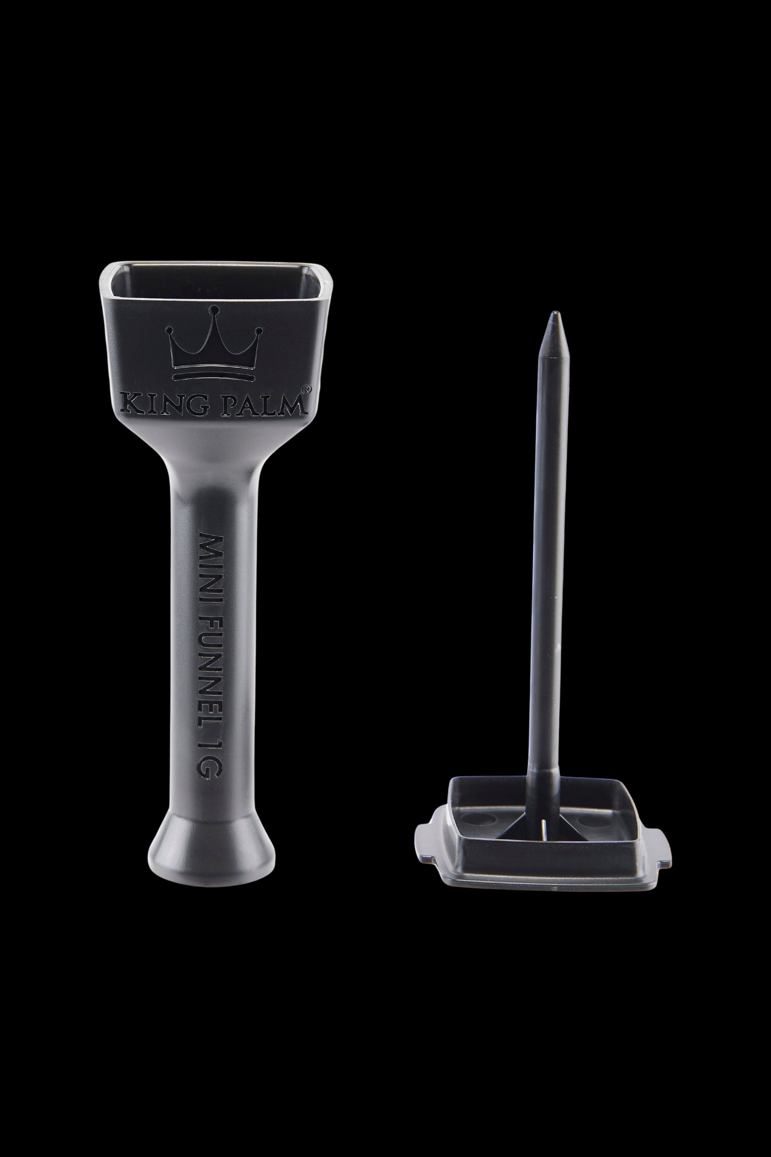 Clear acrylic cannabis smoking accessories including a funnel-shaped bowl, a metal dab tool, and a small collection tray on a black background.