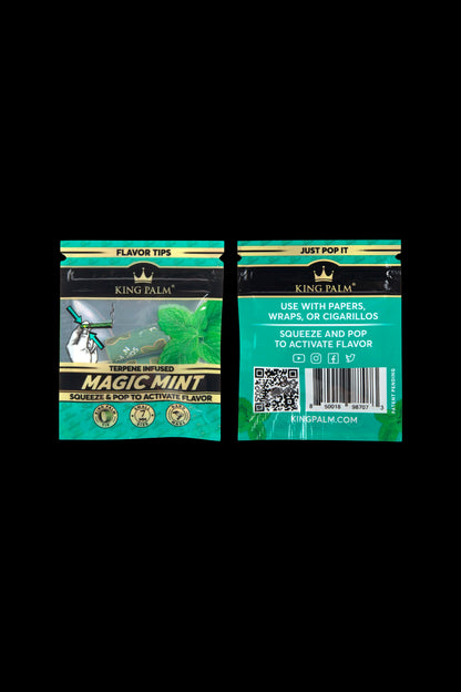 Two packets of King Palm Magic Mint terpene-infused flavor tips for use with papers, wraps, or cigarillos, featuring green and black packaging with instructions to “squeeze & pop” to activate flavor.