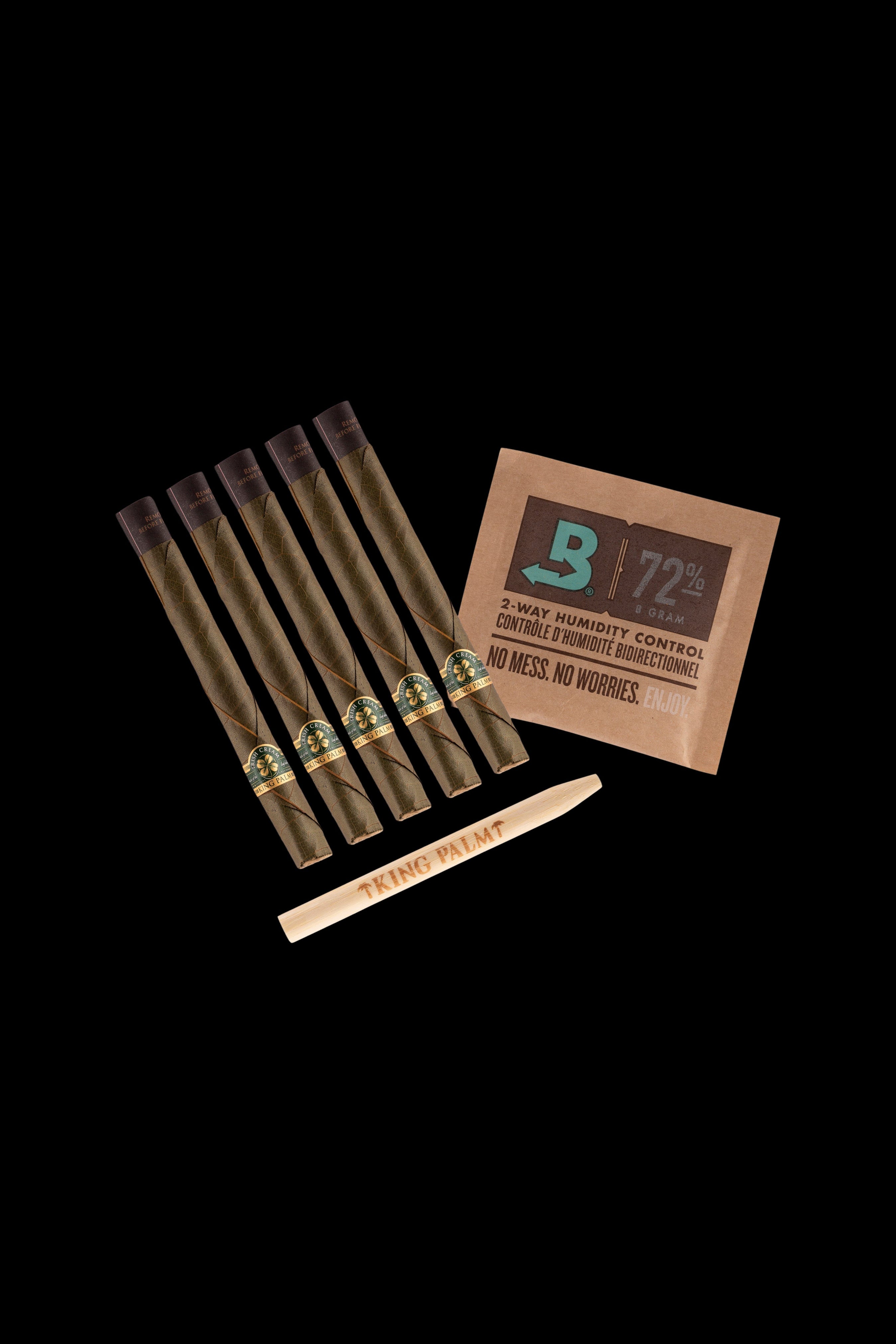 Cannabis pre-rolls with a Boveda humidity control pack on a dark background.