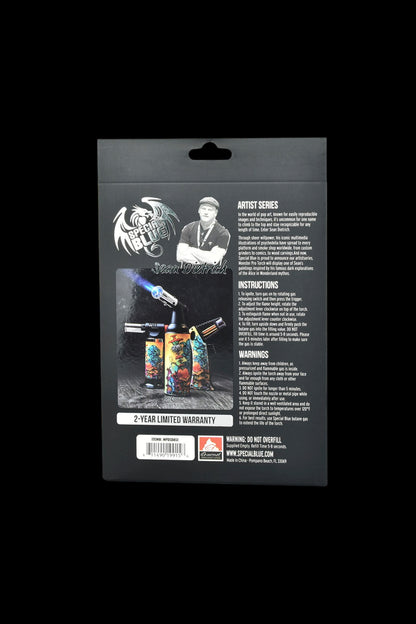 Product packaging for a Special Blue torch lighter, featuring artwork by Sean Desmond and including safety warnings and instructions.