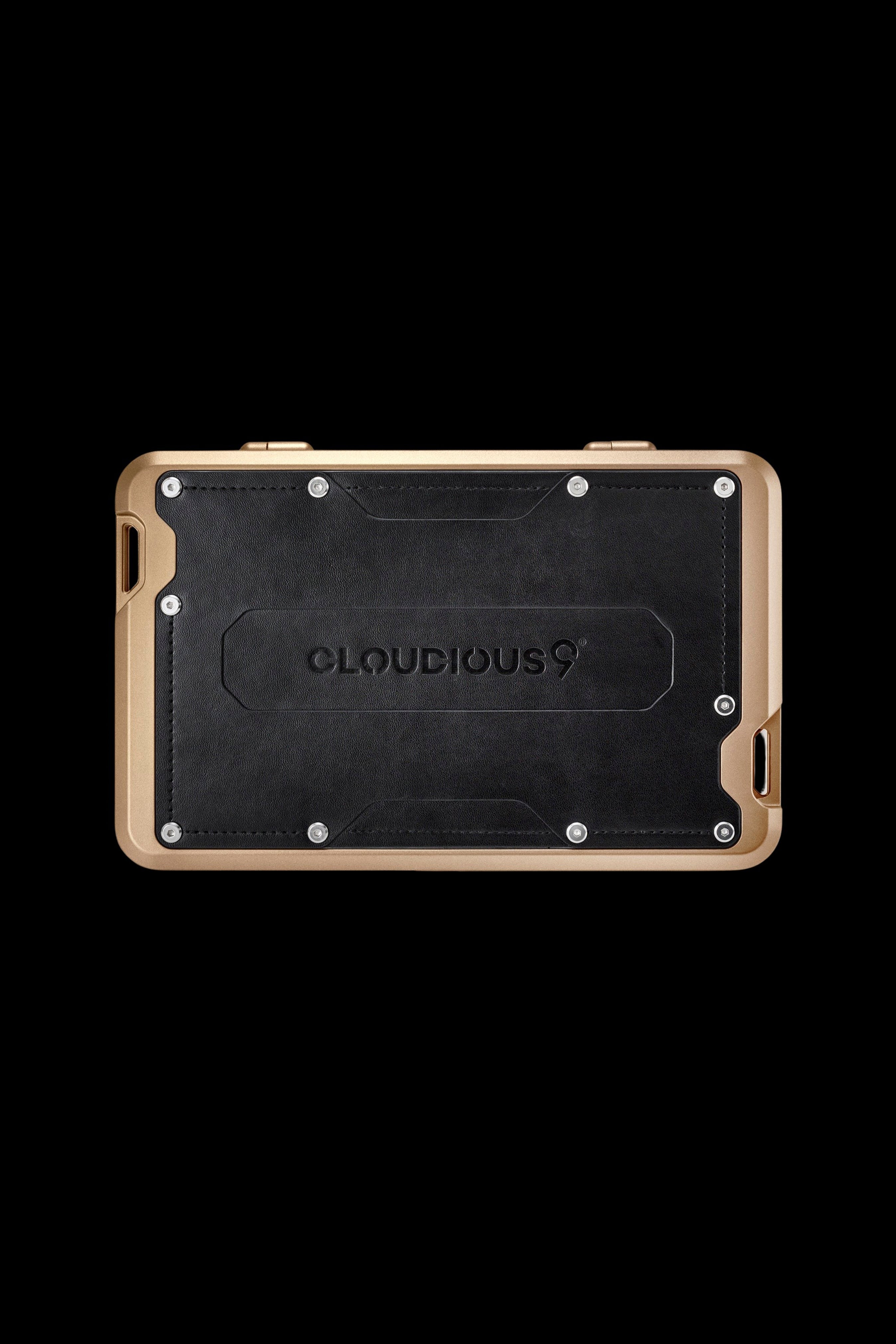 Gold-framed cannabis vaporizer device with “Cloudious9” branding.