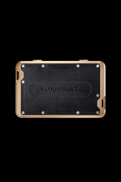 Gold-framed cannabis vaporizer device with “Cloudious9” branding.