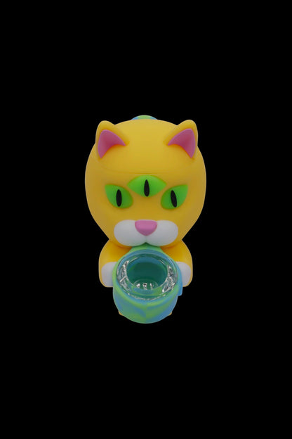 Yellow cat-shaped silicone smoking pipe with a turquoise bowl.
