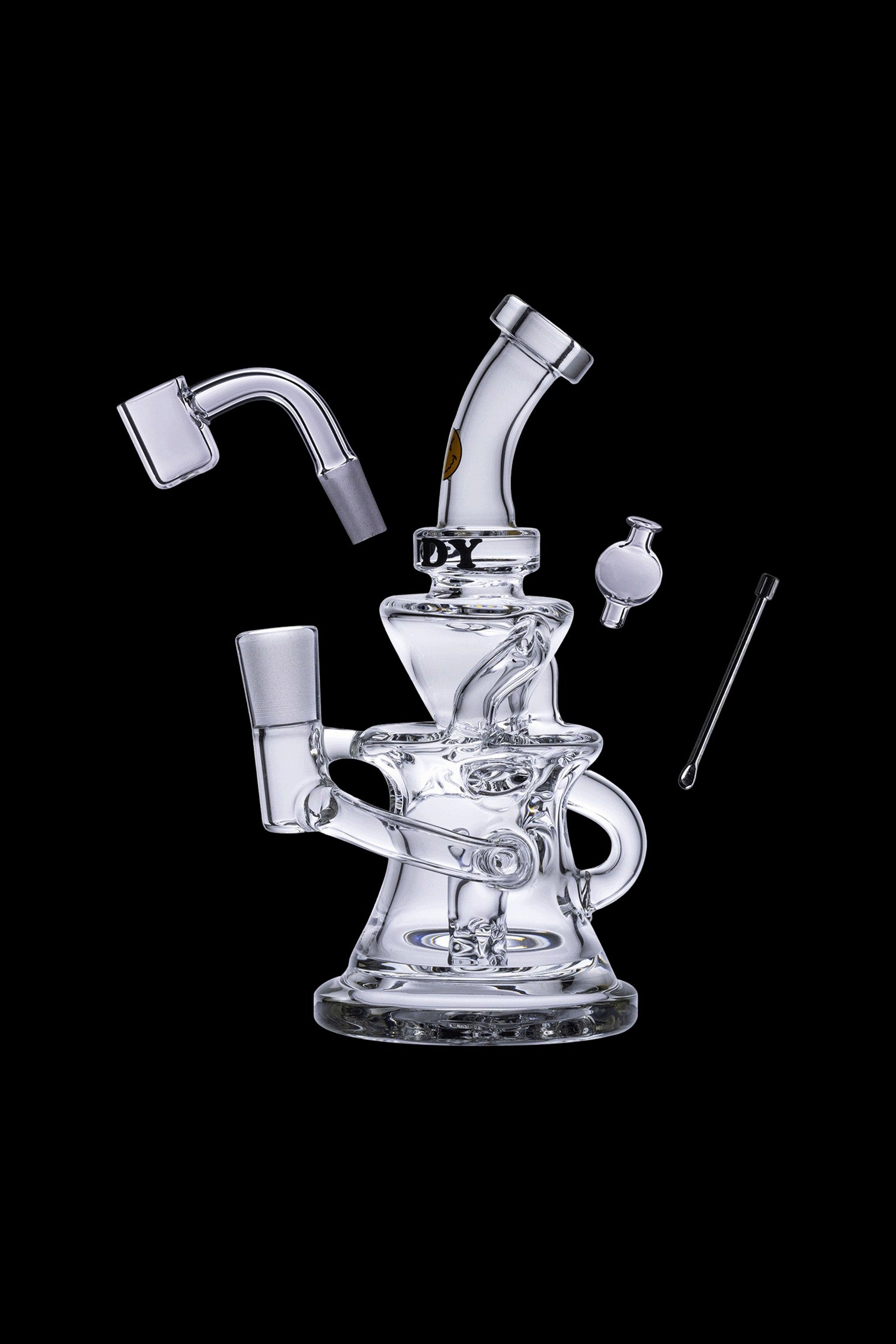 Clear glass dab rig with accessories, isolated on a black background.