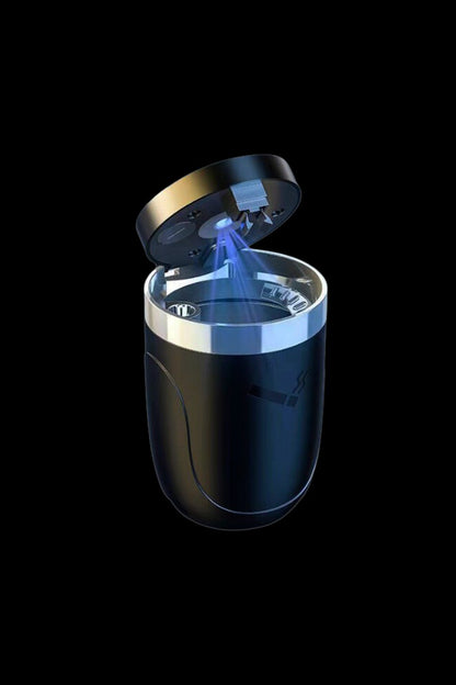 Sleek, black cannabis odor neutralizer with glowing blue air purification system.