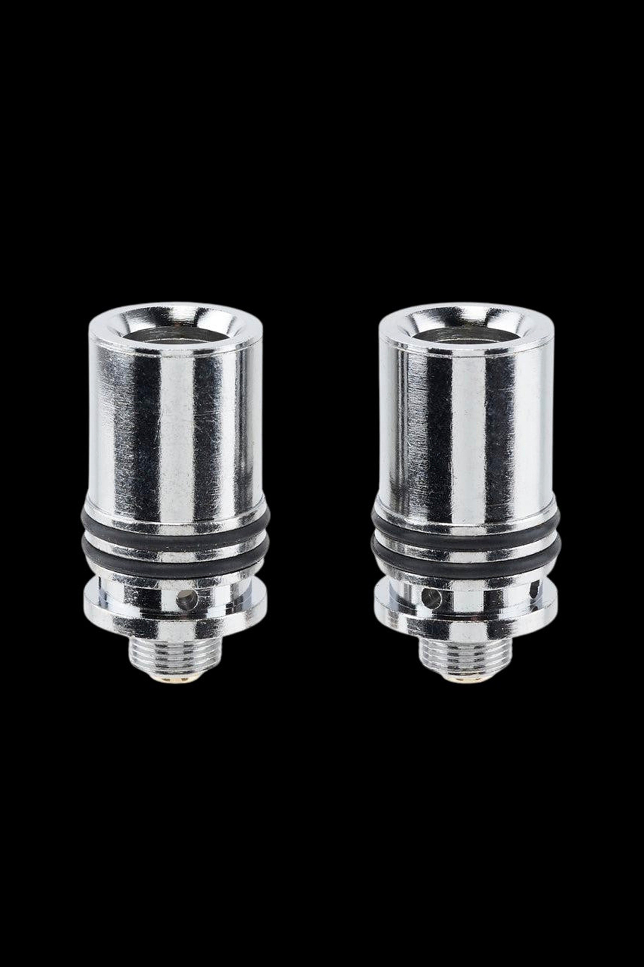 Two silver cannabis oil vape cartridges with black rubber bases on a black background.