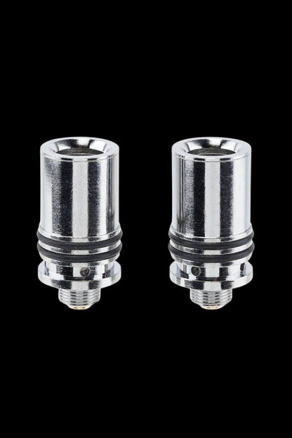Two silver cannabis oil vape cartridges with black rubber bases on a black background.