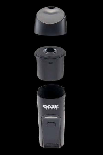 Black Ooze vaporizer pen disassembled into three parts, showcasing the mouthpiece, central chamber, and battery base with branding.