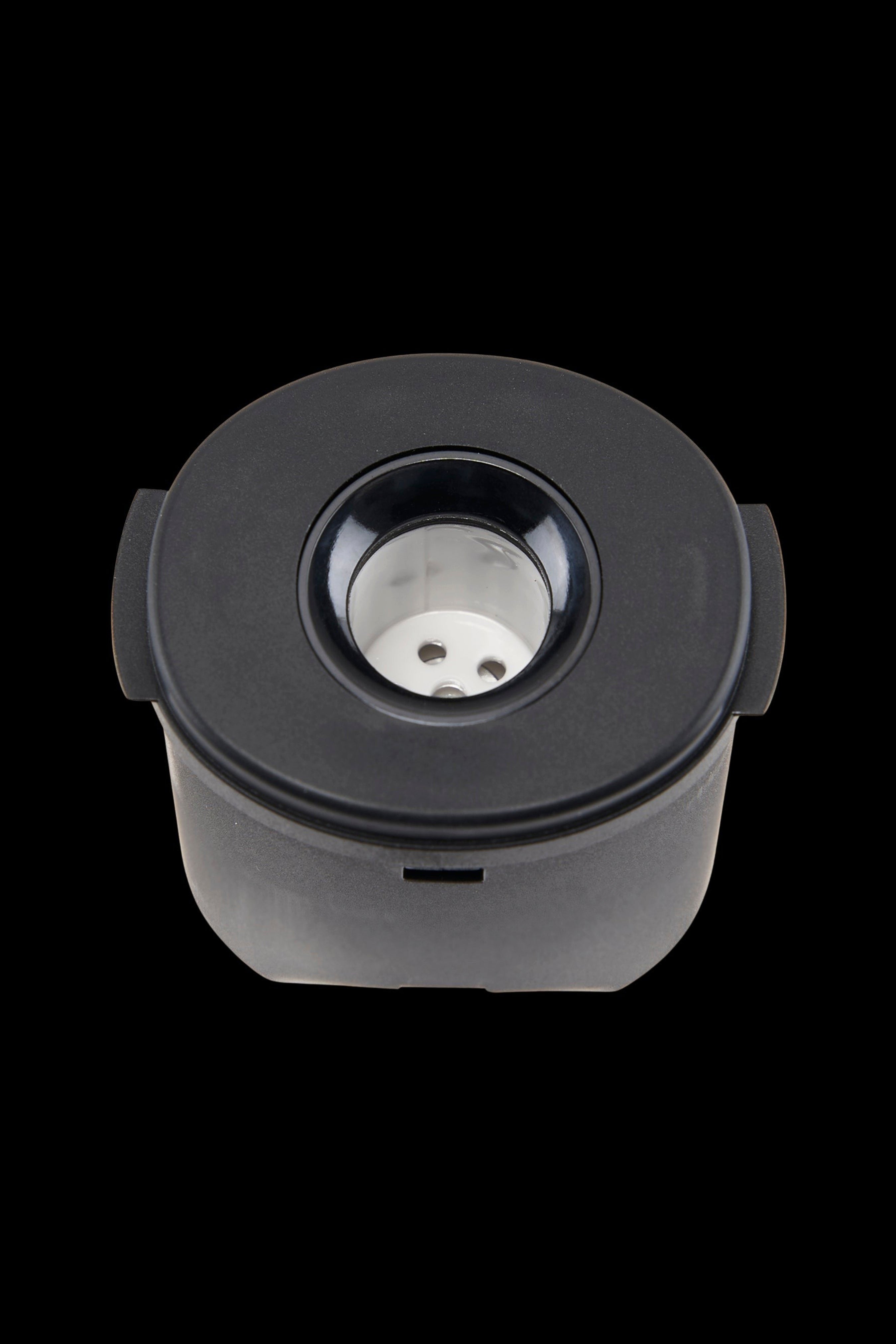 Black cannabis oil vape cartridge with ceramic tip.