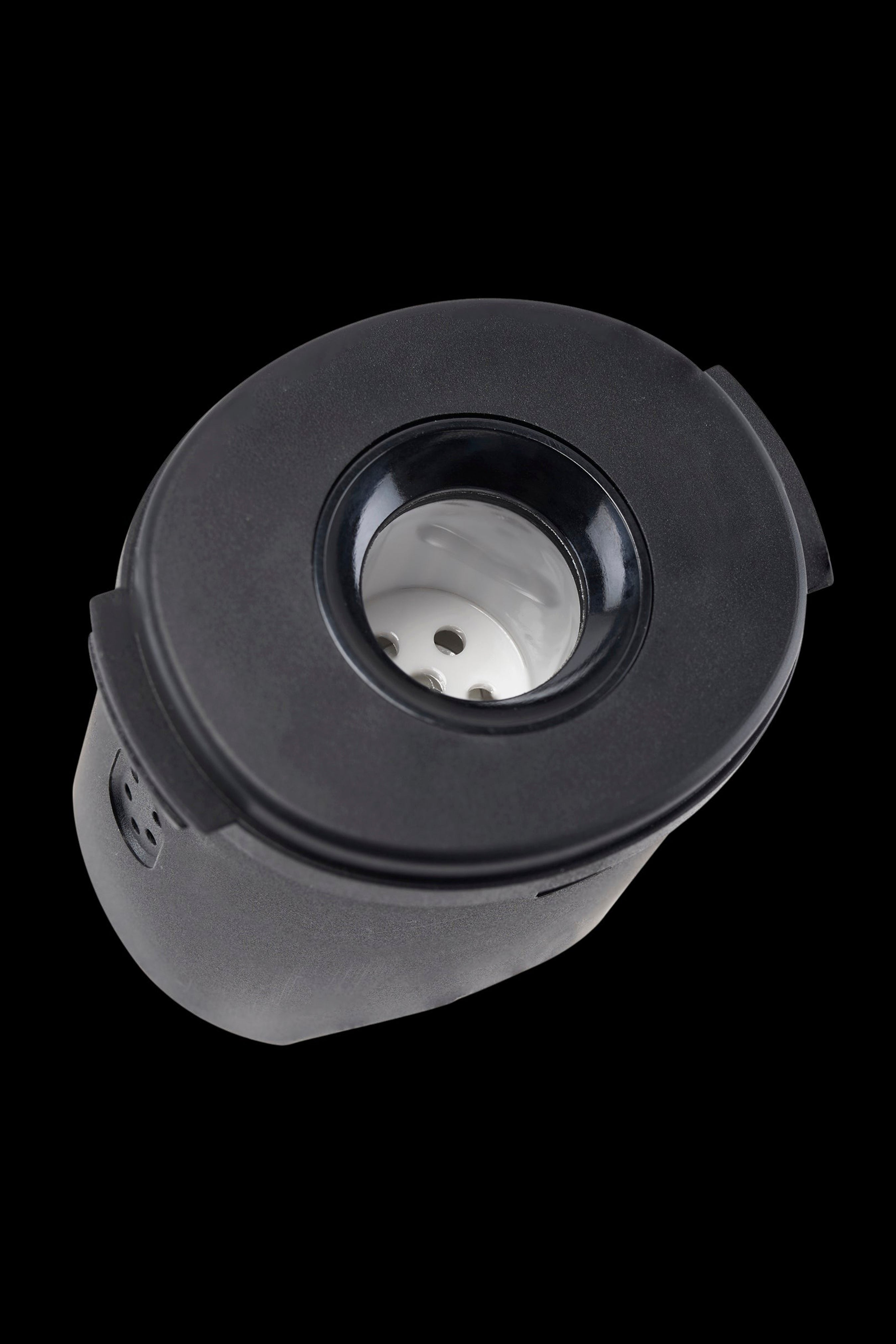 Black cannabis oil burner with glass insert.