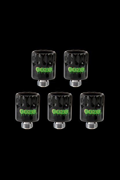 Five black glass dab rigs with green “Ooze” branding against a black background.