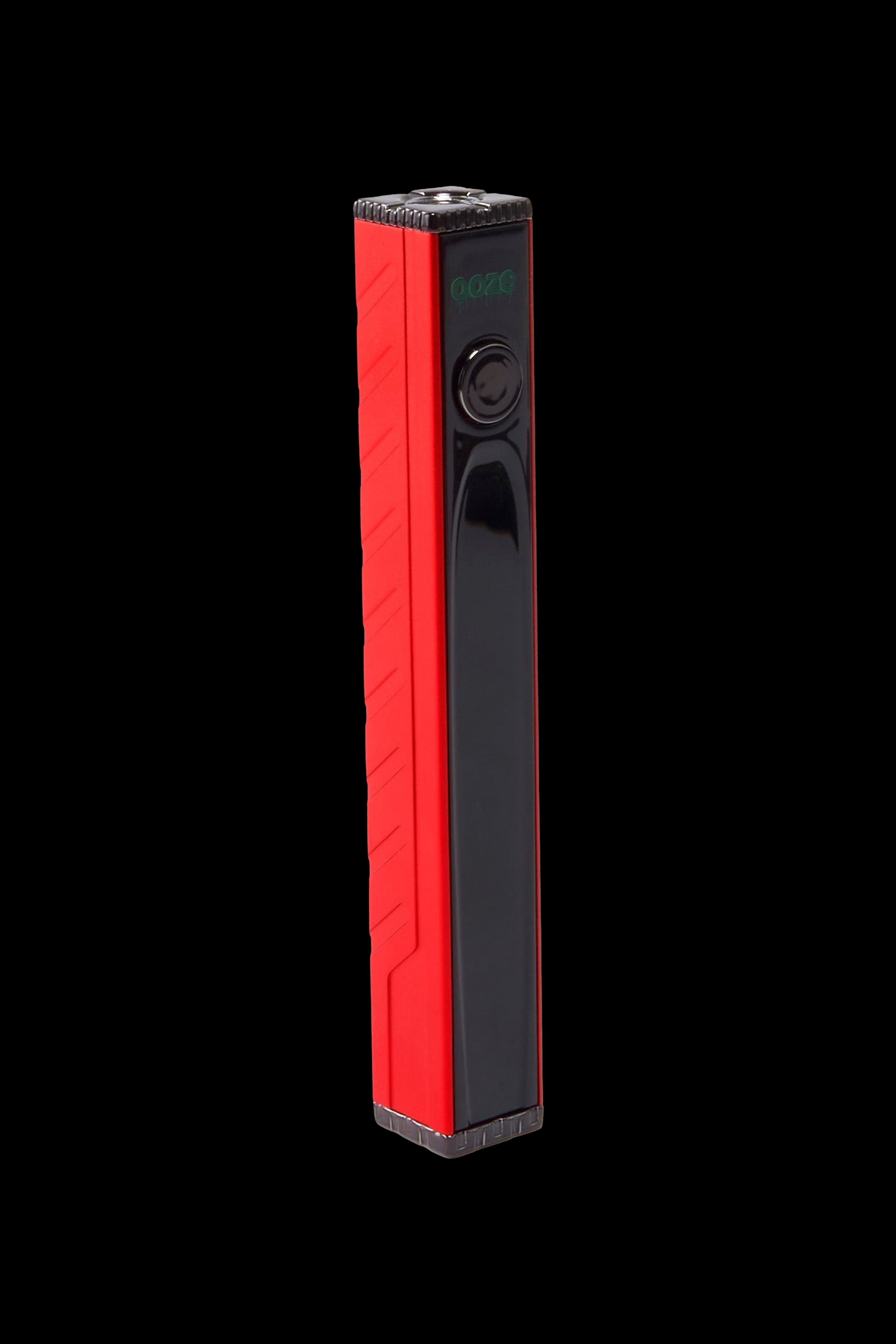 Red and black electronic vaporizer pen with a digital display.