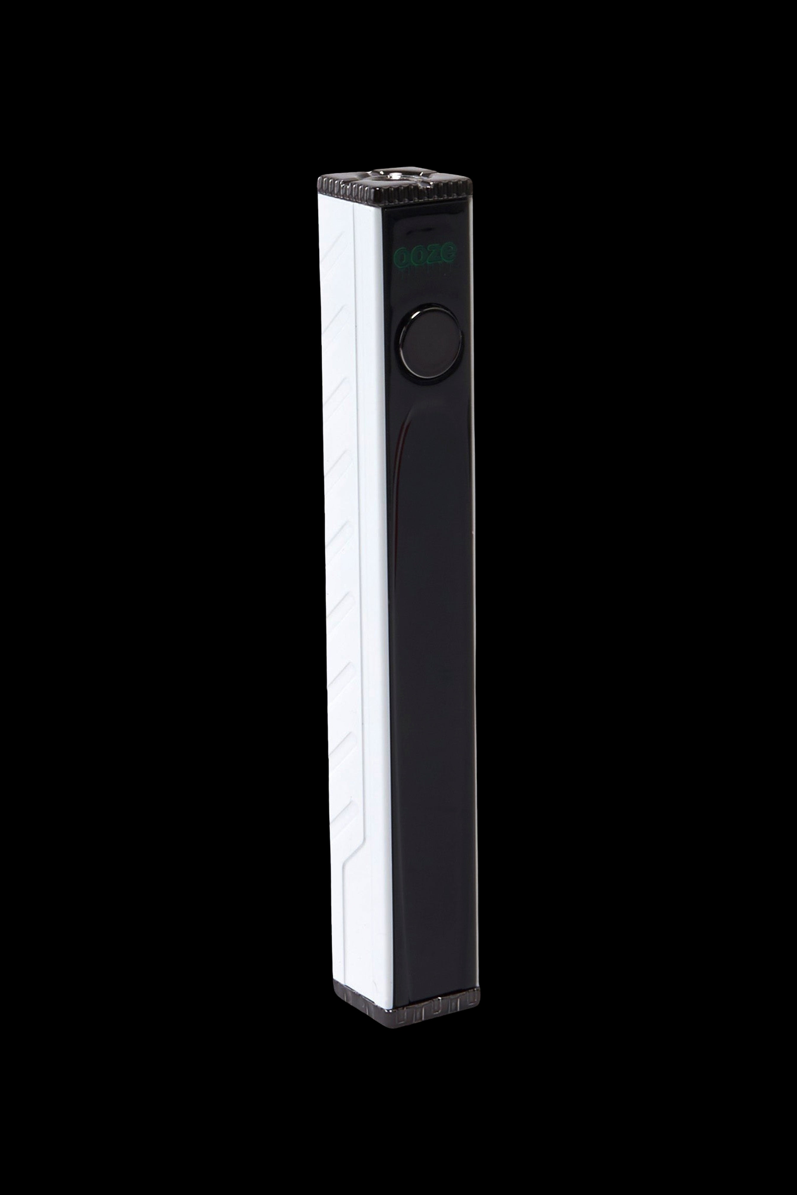 Sleek black and white cannabis vaporizer pen with a digital display.
