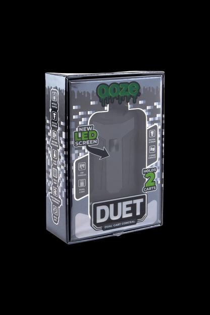 Three-quarter front view of the boxed Ooze Duet 510 Dual Conceal Cart Battery against a black background.