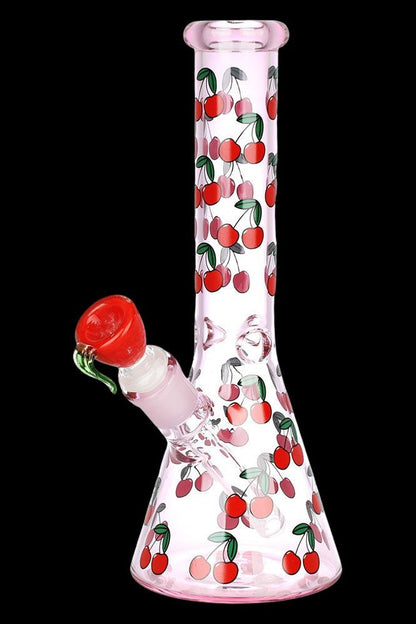 Pink glass bong decorated with red cherries against a black background.