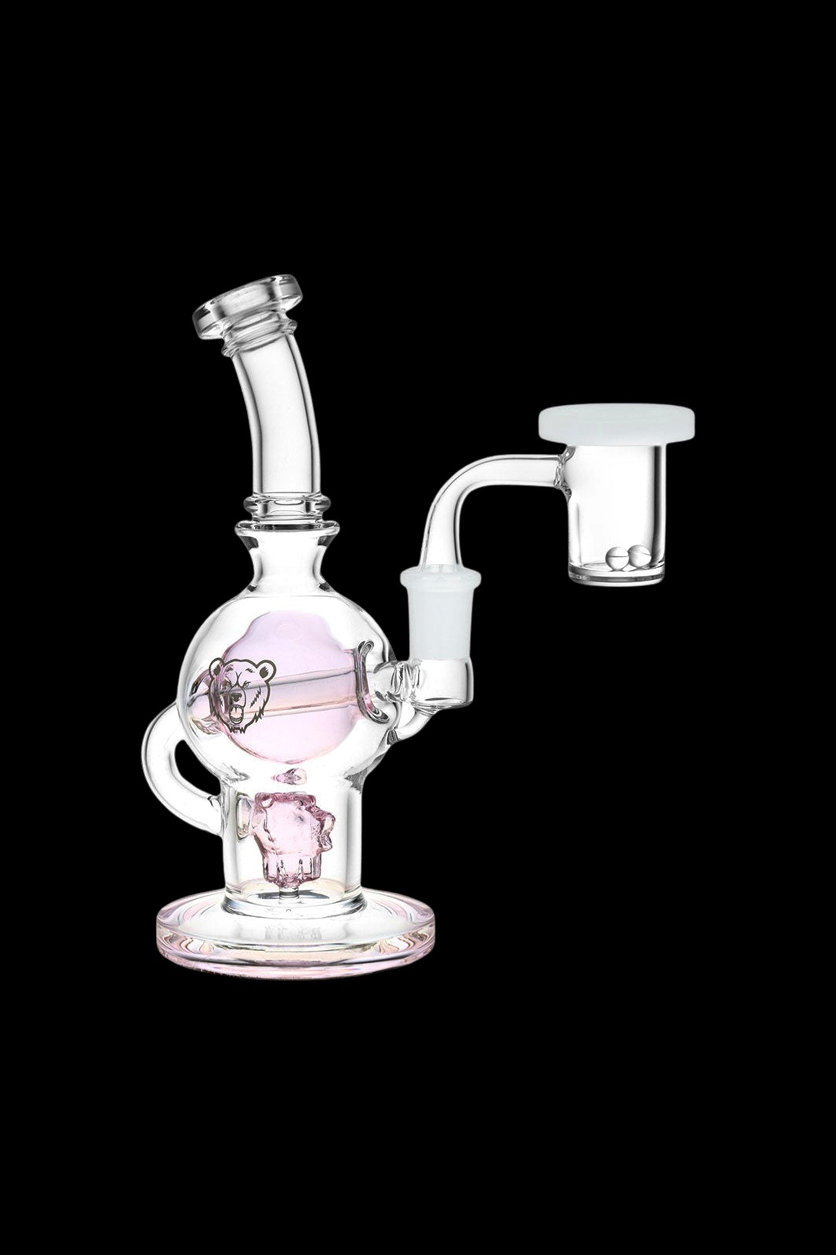 Glass water pipe with a skull and bear design, featuring a separate glass bowl.