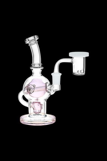 Glass water pipe with a skull and bear design, featuring a separate glass bowl.