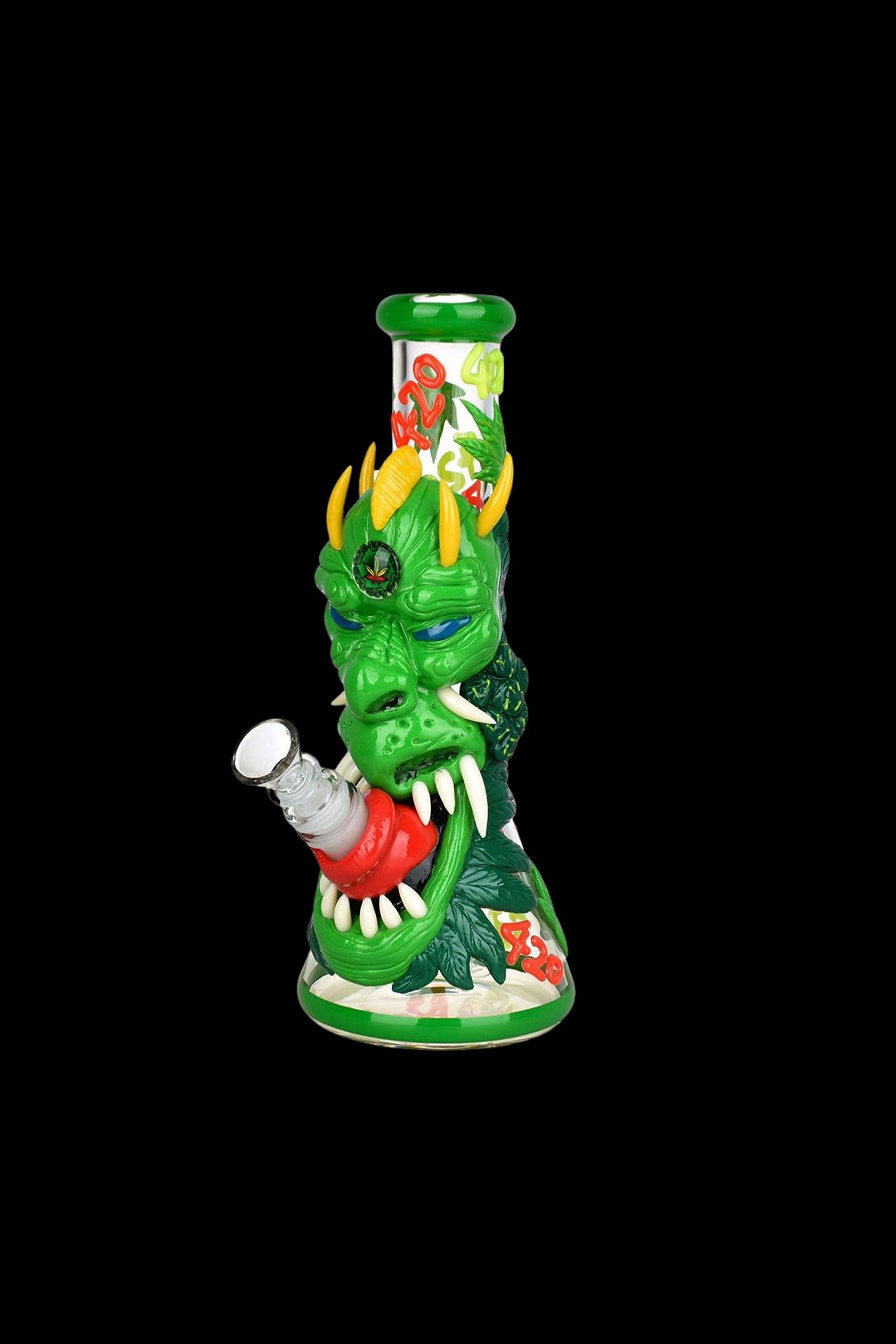 Green glass water pipe shaped like a dragon’s head with cannabis leaf detailing.