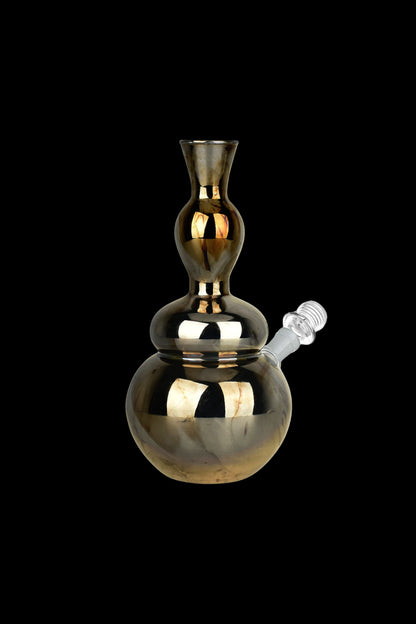 Polished glass water pipe with rounded bulb and flared mouthpiece, isolated on black.