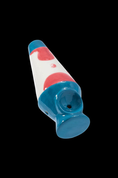 Patriotic glass pipe with red, white, and blue swirl design.